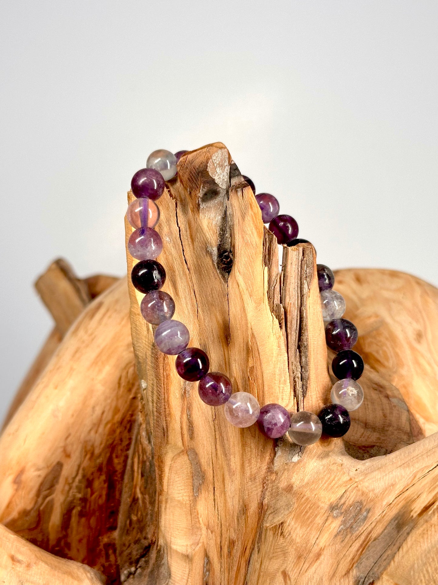 Bracelet boule 8mm Fluorine violette AB